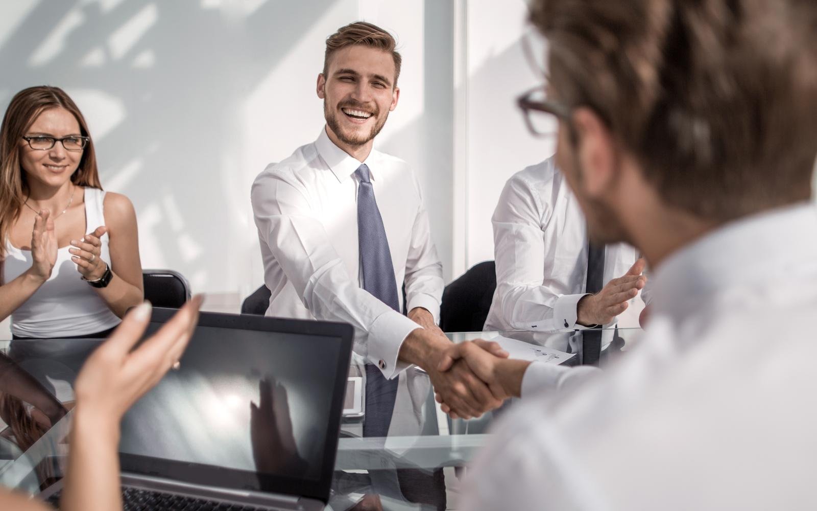 handshake of business people on a work Desk. People Investment at work